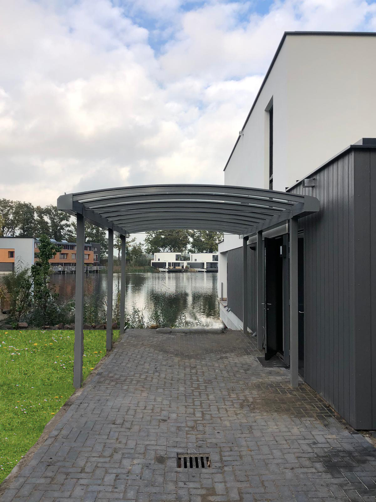 Welke carport fundering is er nodig voor een grijze aluminium carport