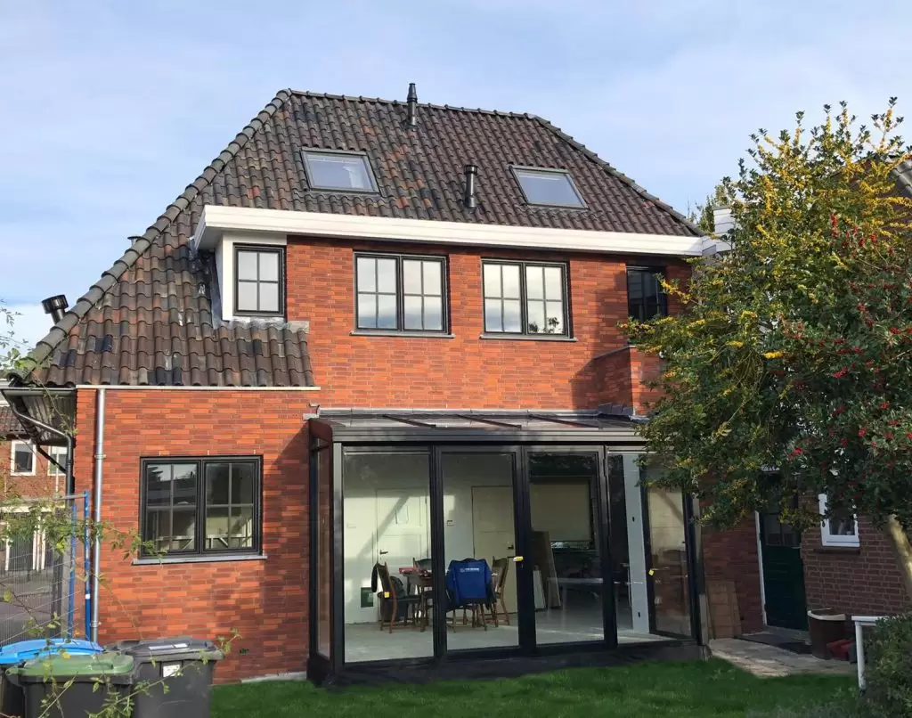 Serre op uw veranda met lessenaarsdak